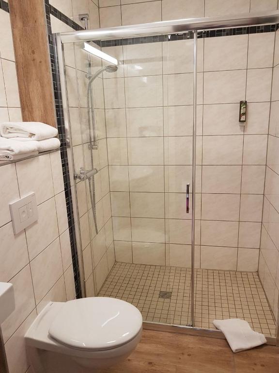 Koupelna v ubytování Hotel Medaillon