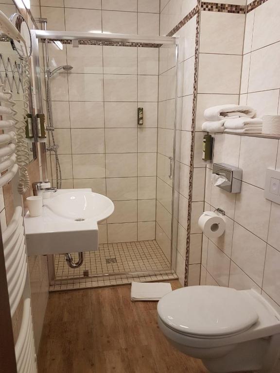 Koupelna v ubytování Hotel Medaillon