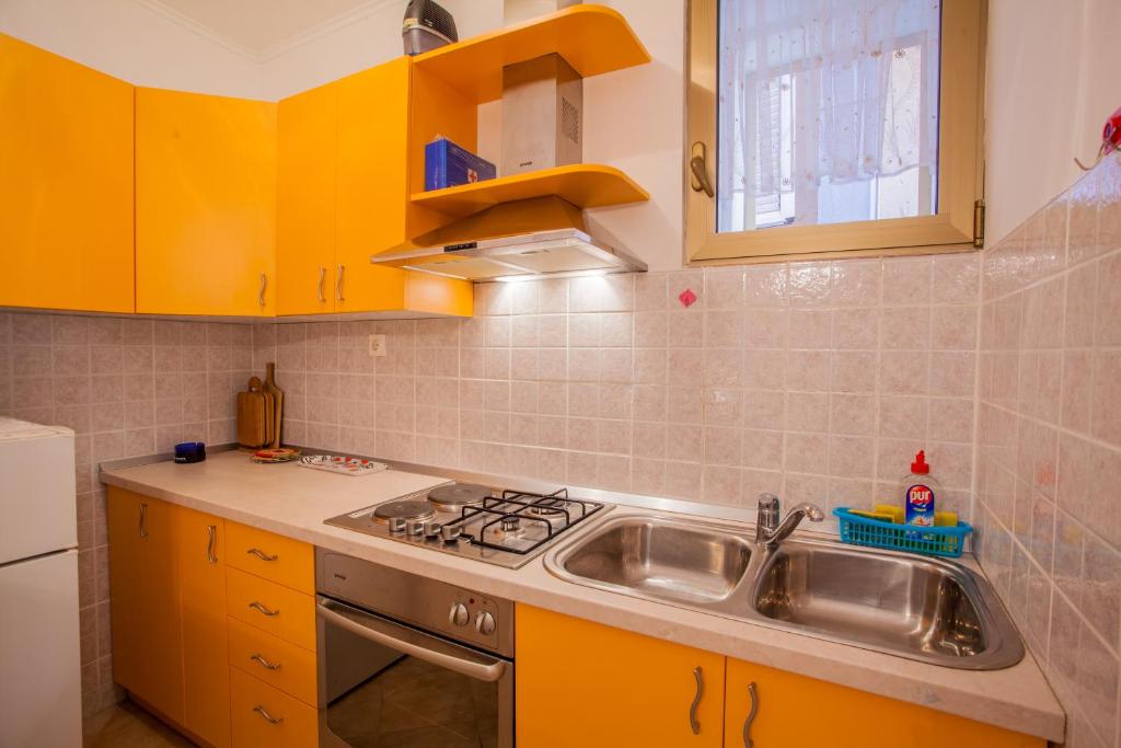Kuchyň nebo kuchyňský kout v ubytování Apartments Dabović