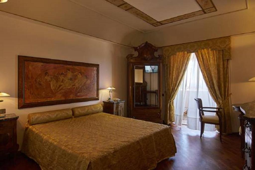 Postel nebo postele na pokoji v ubytování Hotel Tritone Lipari