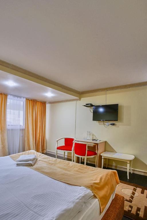 TV a/nebo společenská místnost v ubytování Jasmine Hotel