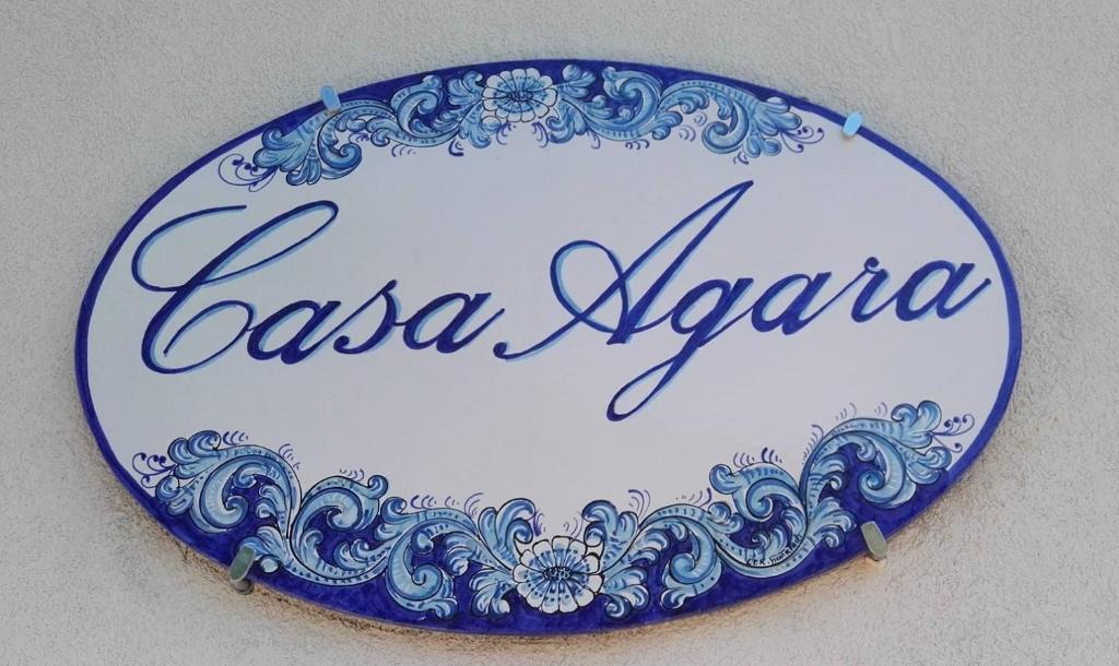 een blauwe en witte plaat met de woorden salsa azona bij Casa Vacanze Agara in Vietri