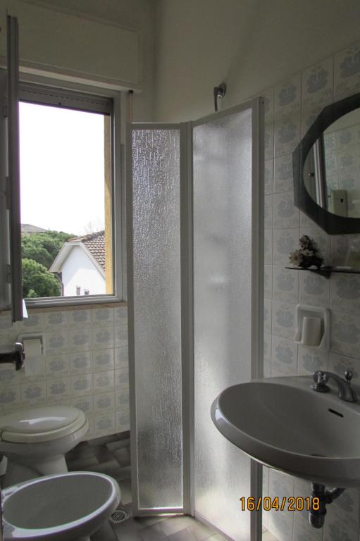 Koupelna v ubytování Hotel Toschi