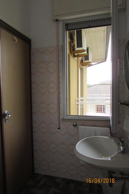 Koupelna v ubytování Hotel Toschi