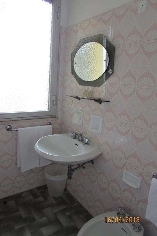 Koupelna v ubytování Hotel Toschi