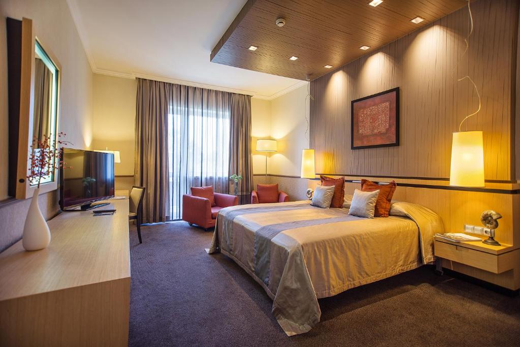 Postel nebo postele na pokoji v ubytování Mamaison Hotel Andrassy Budapest
