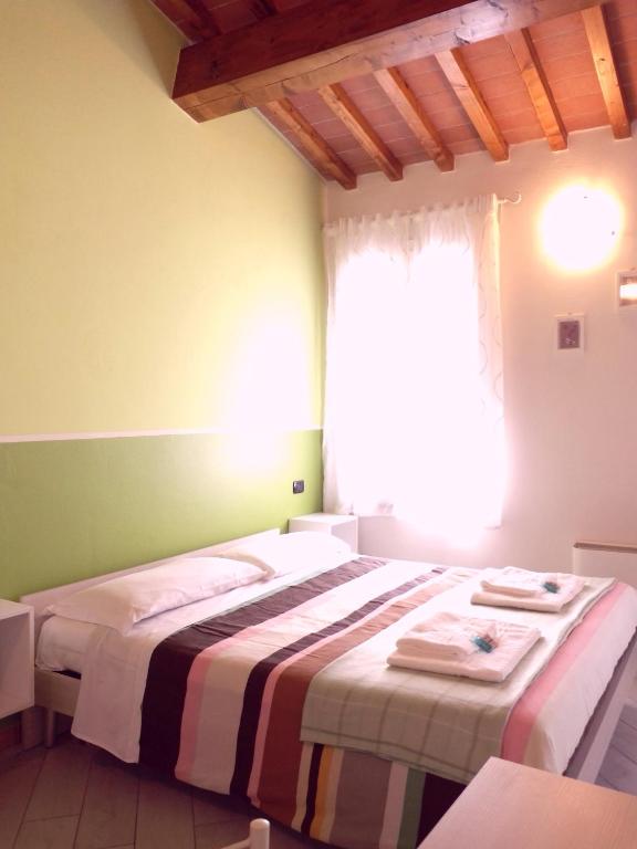 Postel nebo postele na pokoji v ubytování B&B Bianchi 64