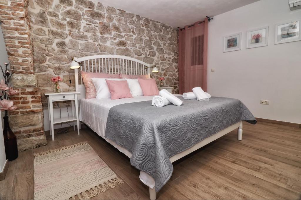Posteľ alebo postele v izbe v ubytovaní Cozy Apartment MARÌ