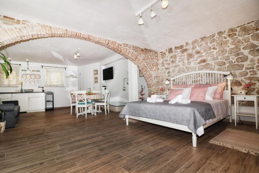 Kuchyňa alebo kuchynka v ubytovaní Cozy Apartment MARÌ