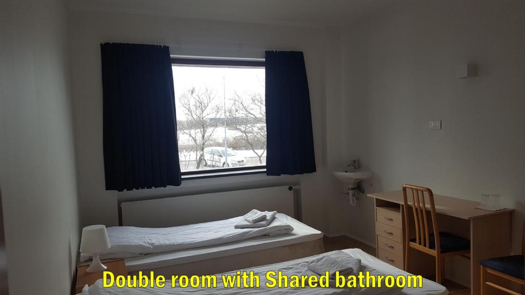 Postel nebo postele na pokoji v ubytování Travel Inn