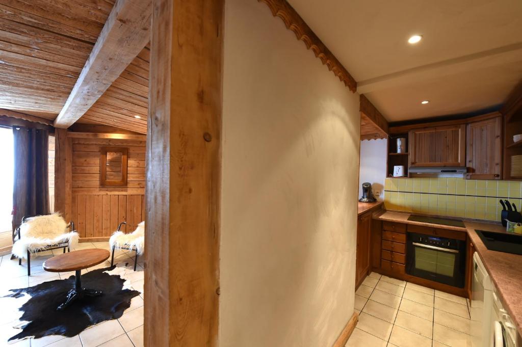 Kuchyň nebo kuchyňský kout v ubytování Ancolies Val Thorens