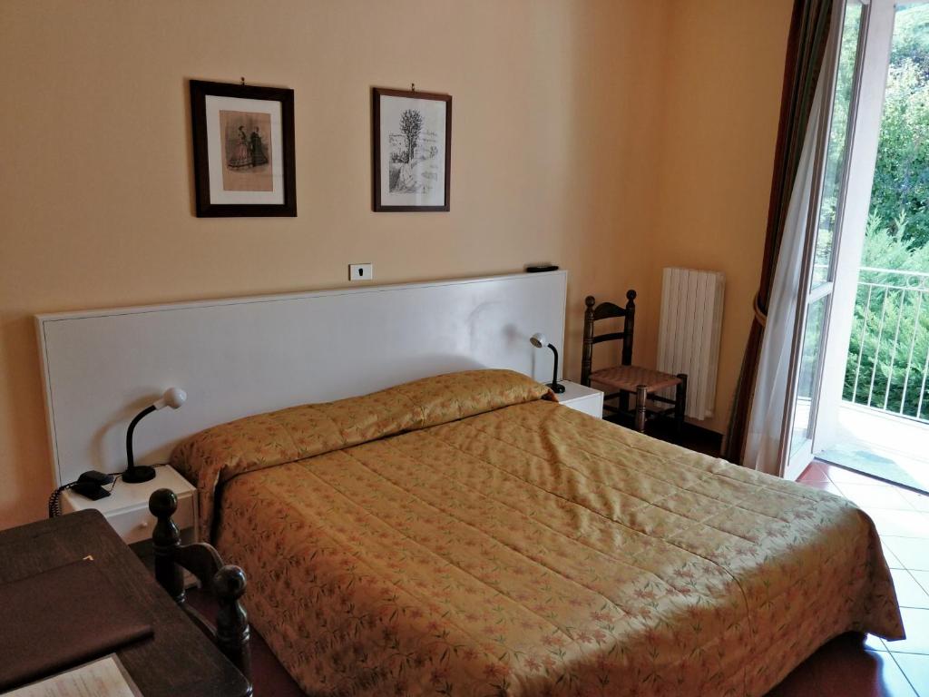 Lova arba lovos apgyvendinimo įstaigoje Hotel Barolo Classico