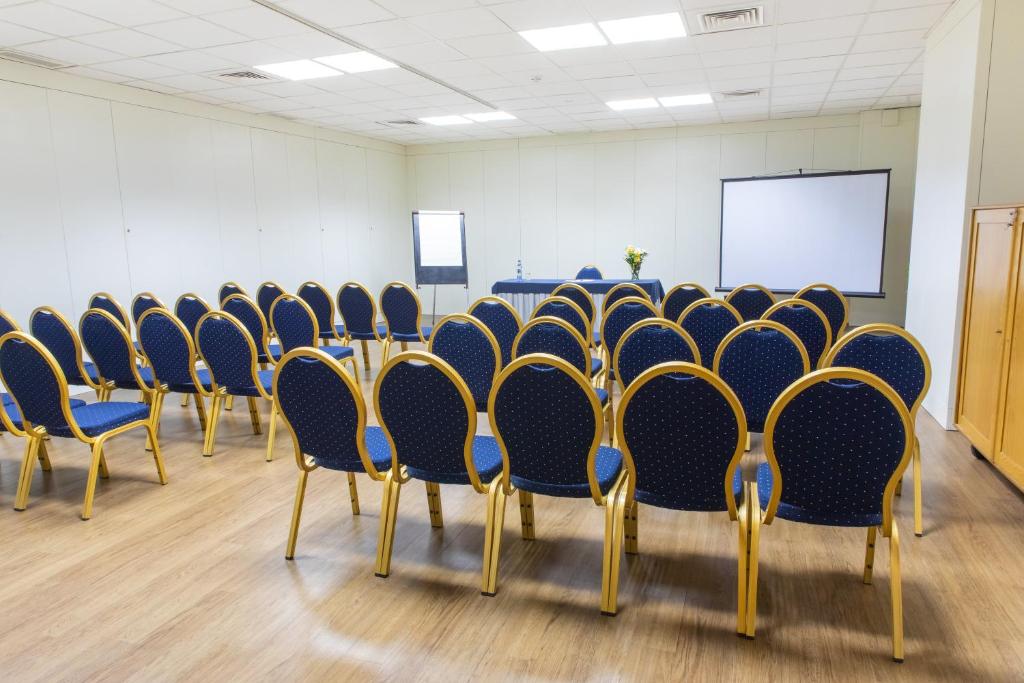 Área de negócios e/ou sala de conferências em Hotel Black Tulip - Porto Gaia