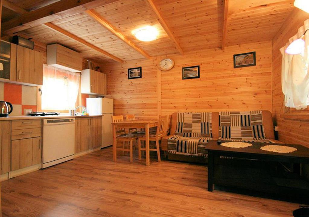 Kuchyň nebo kuchyňský kout v ubytování Sztil - Apartamenty i drewniane domki