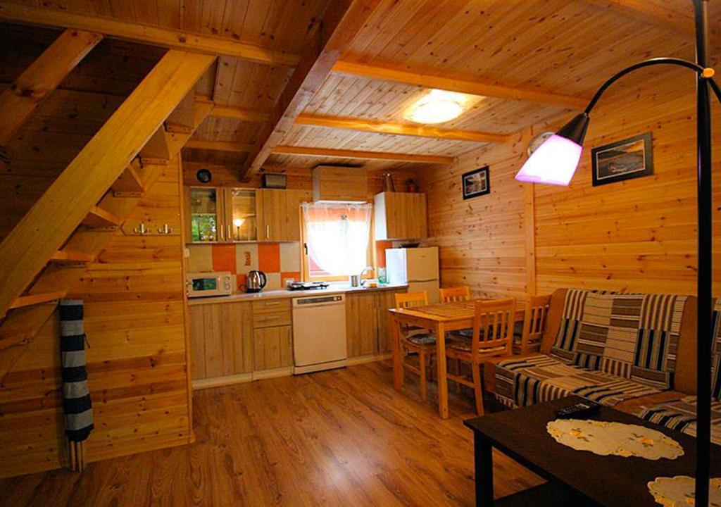Kuchyň nebo kuchyňský kout v ubytování Sztil - Apartamenty i drewniane domki