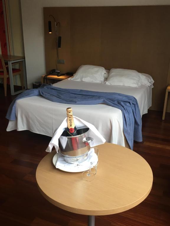 A bed or beds in a room at Hotel Ril