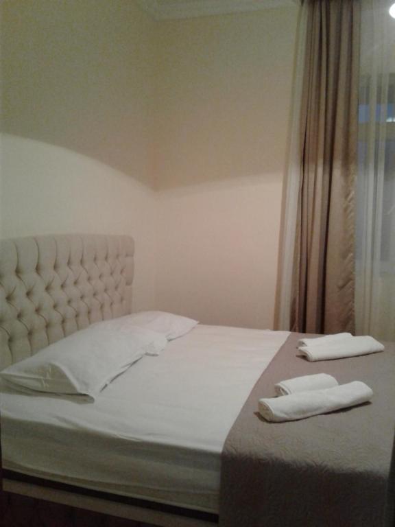 Postel nebo postele na pokoji v ubytování Gonio Apsaros House