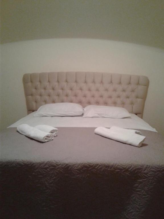 Postel nebo postele na pokoji v ubytování Gonio Apsaros House