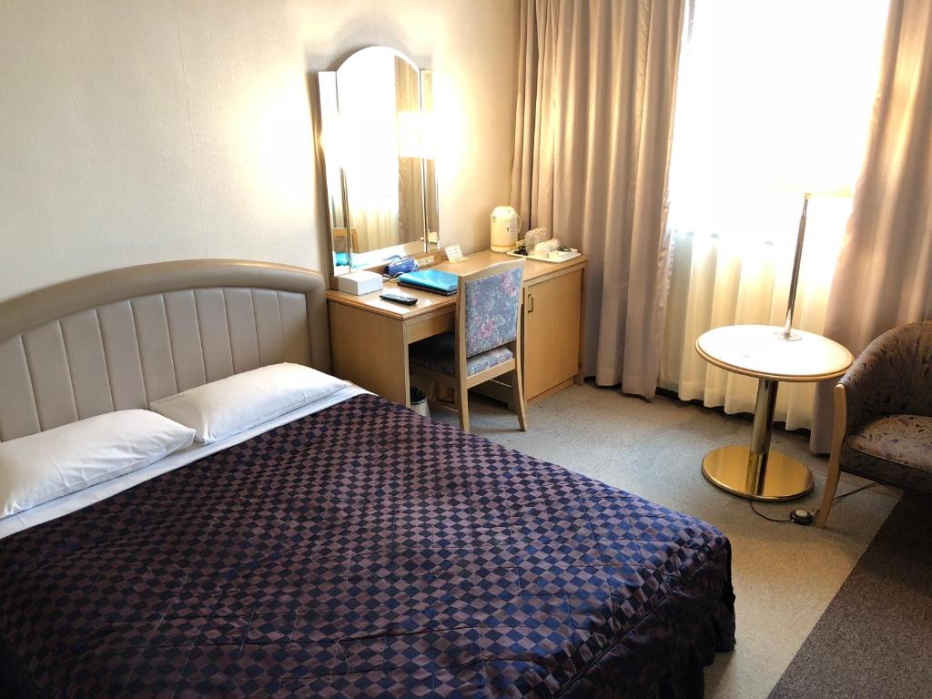 Postel nebo postele na pokoji v ubytování Urayasu Beaufort Hotel
