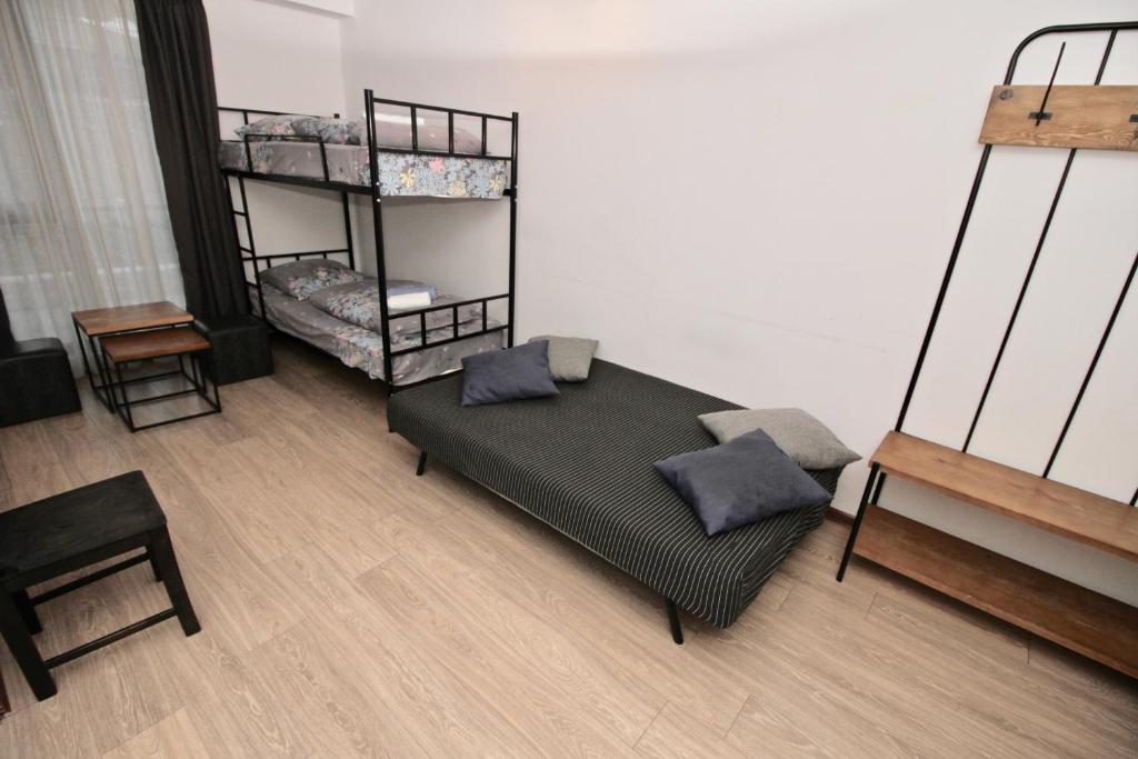 Postel nebo postele na pokoji v ubytování Apartment N322 Gudauri Loft