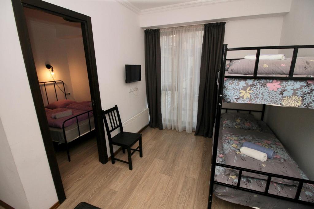 Postel nebo postele na pokoji v ubytování Apartment N322 Gudauri Loft