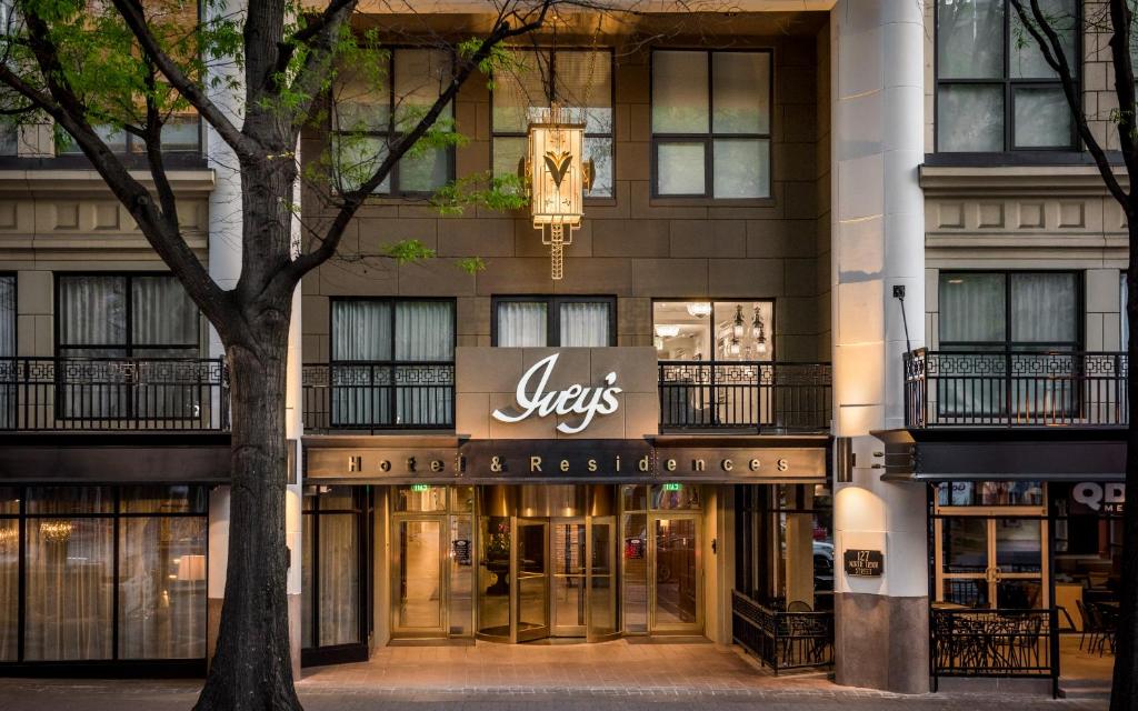 a store front of a building with a sign on it at The Ivey's Hotel in Charlotte