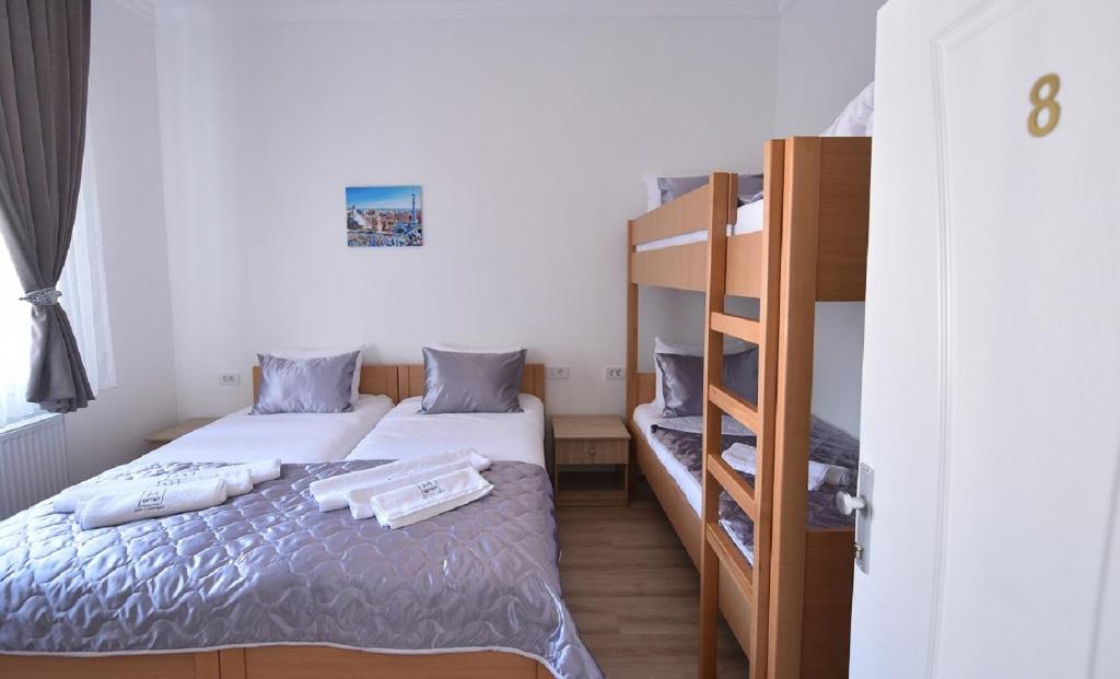 Postel nebo postele na pokoji v ubytování Villa Nina Hotel & Lounge bar