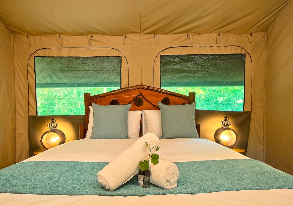 Voodi või voodid majutusasutuse Kruger Adventure Lodge toas