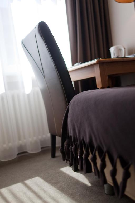 Postel nebo postele na pokoji v ubytování Hotel De Hofkamers