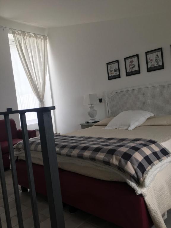 Łóżko lub łóżka w pokoju w obiekcie Villa Manu