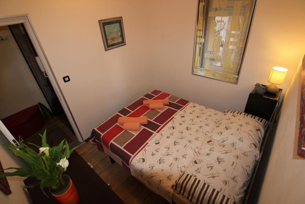 Posteľ alebo postele v izbe v ubytovaní Zadar Center Apartment