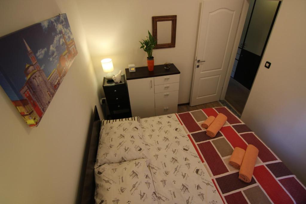 Posteľ alebo postele v izbe v ubytovaní Zadar Center Apartment