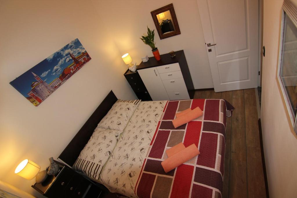 Posteľ alebo postele v izbe v ubytovaní Zadar Center Apartment