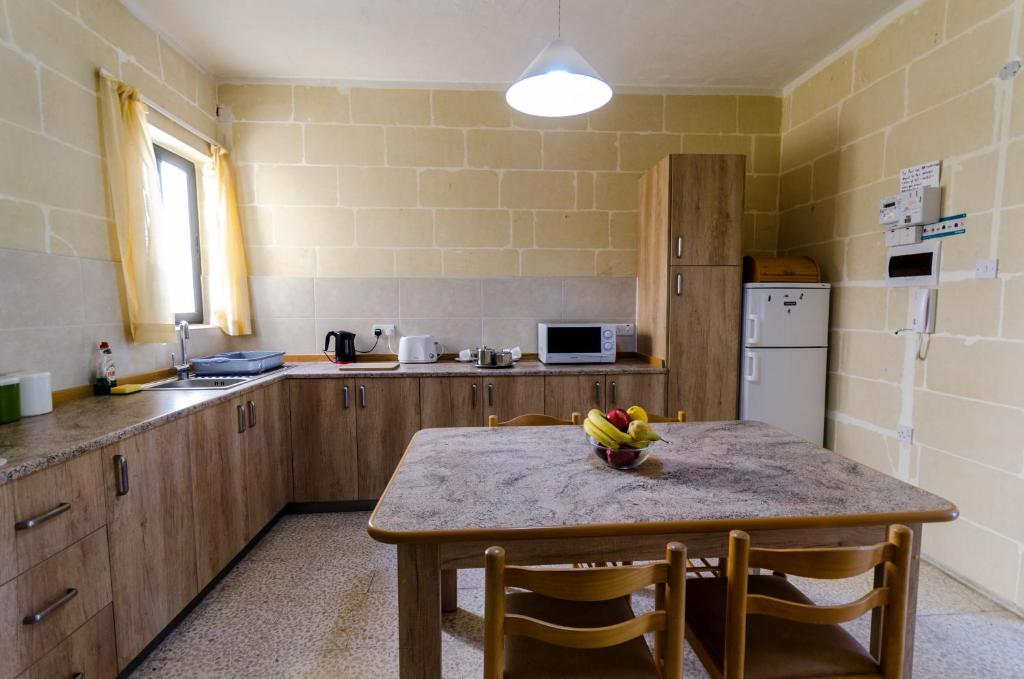 Kuchyň nebo kuchyňský kout v ubytování Maryanne-Joe Flats