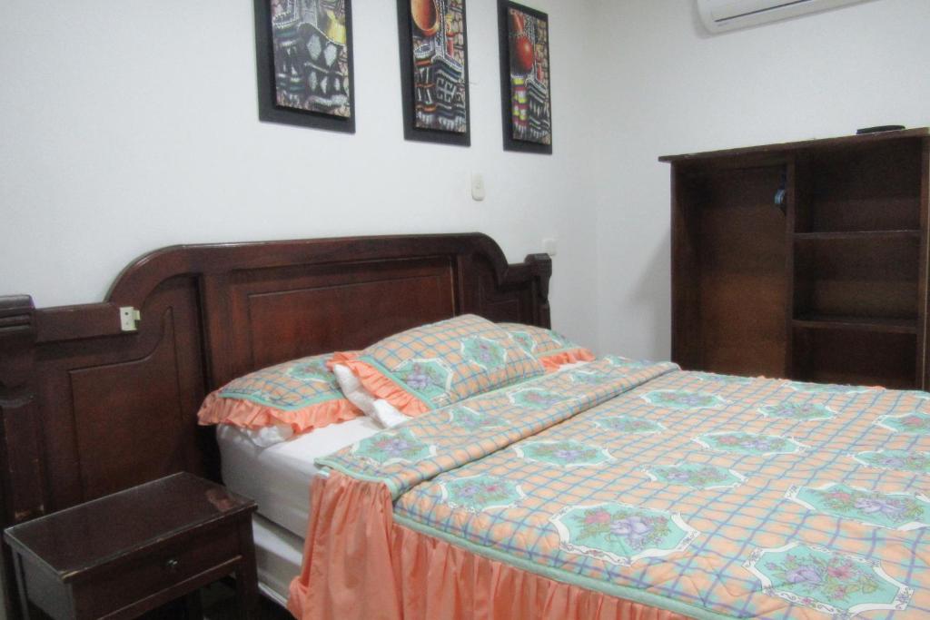 Postel nebo postele na pokoji v ubytování Hotel Nuevo Tio