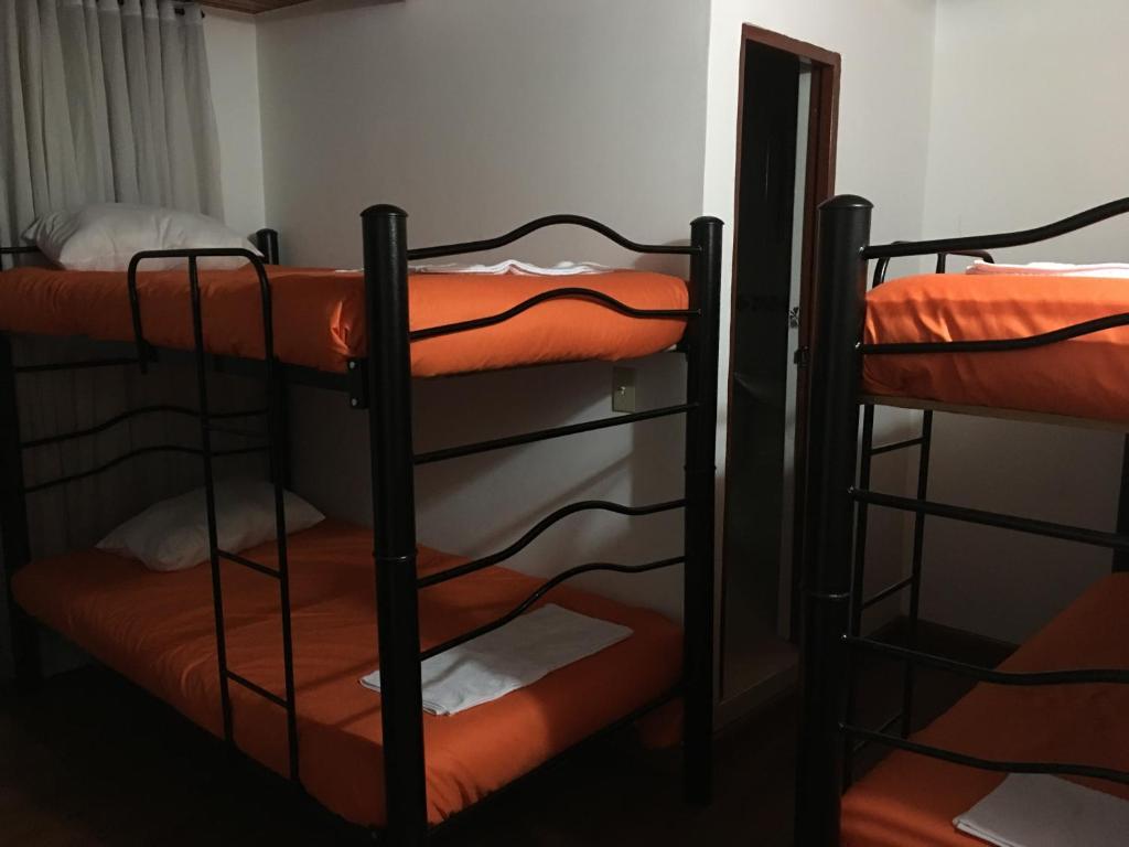 Postel nebo postele na pokoji v ubytování Casa hotel Sports and Family