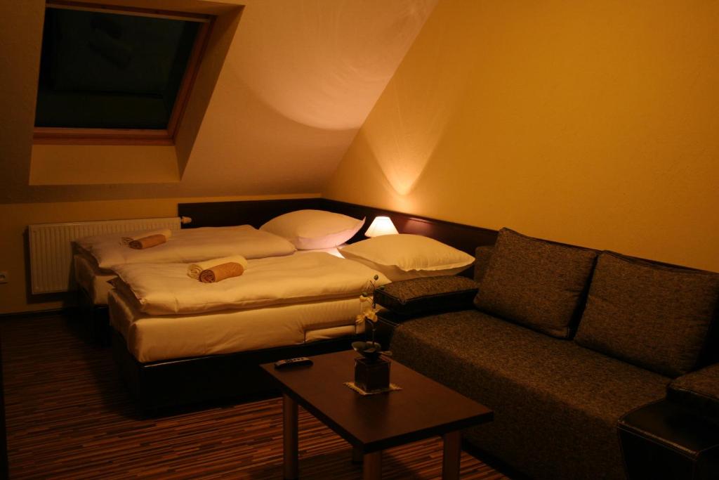 Postel nebo postele na pokoji v ubytování Apartamenty Starka