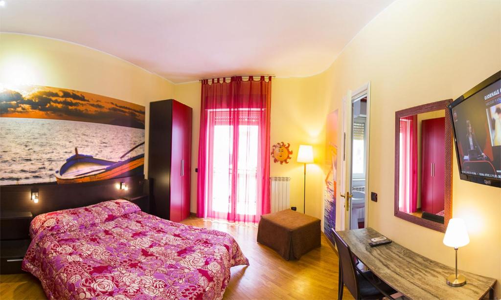 Televízia a/alebo spoločenská miestnosť v ubytovaní Solaris B&B