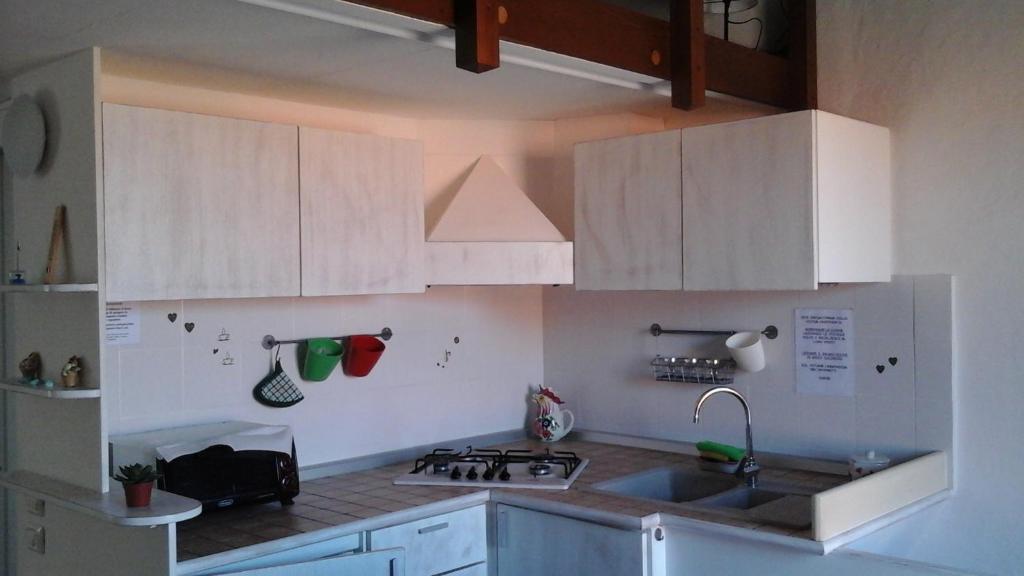 Kuchyň nebo kuchyňský kout v ubytování Maisonette Tommy