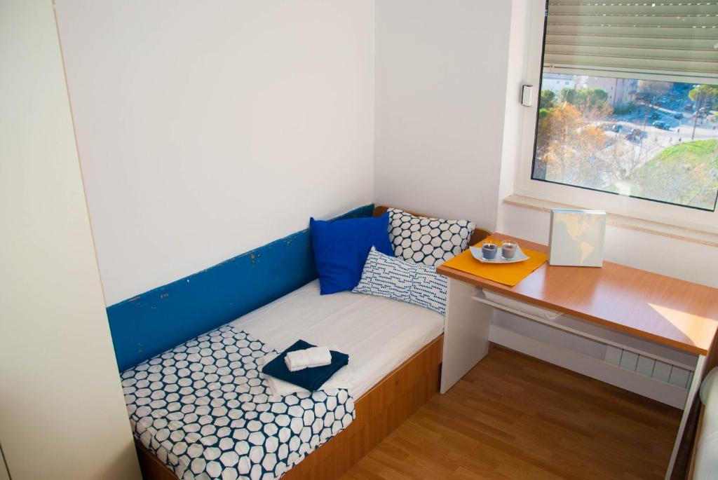Postel nebo postele na pokoji v ubytování Split Summer Budget Rooms