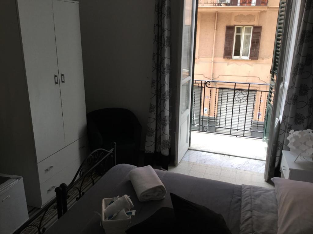 Letto o letti in una camera di Alba Camere
