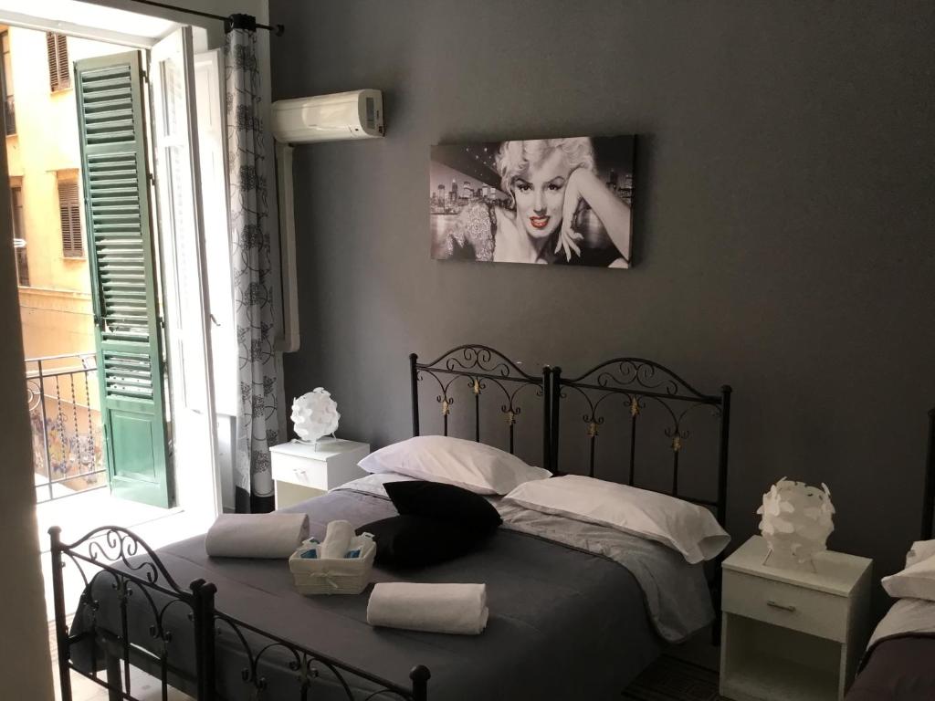 Letto o letti in una camera di Alba Camere
