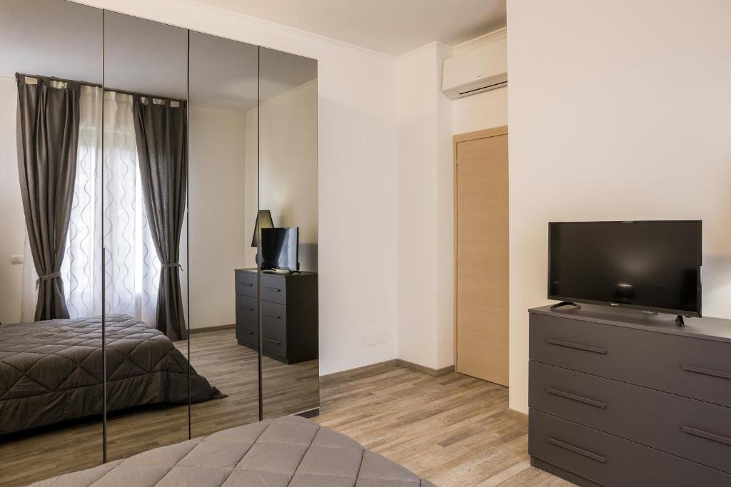 Televízia a/alebo spoločenská miestnosť v ubytovaní Residence Hill