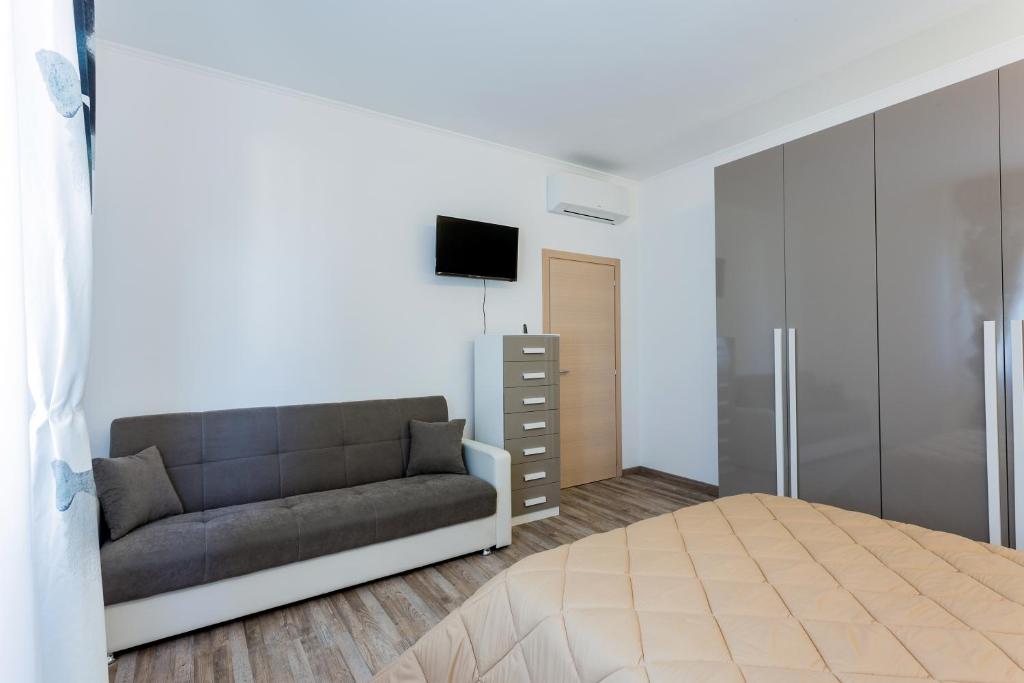 Televízia a/alebo spoločenská miestnosť v ubytovaní Residence Hill