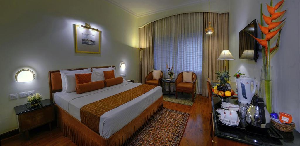 Postel nebo postele na pokoji v ubytování Hotel Clarks Varanasi Limited