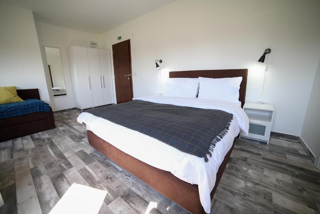 Postel nebo postele na pokoji v ubytování Guesthouse & restaurant Tekovina