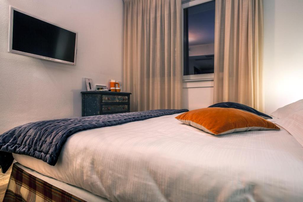 Postel nebo postele na pokoji v ubytování Spluga Sosta & Hotel
