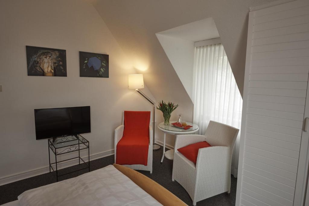 TV a/nebo společenská místnost v ubytování Hotel Burgfeld