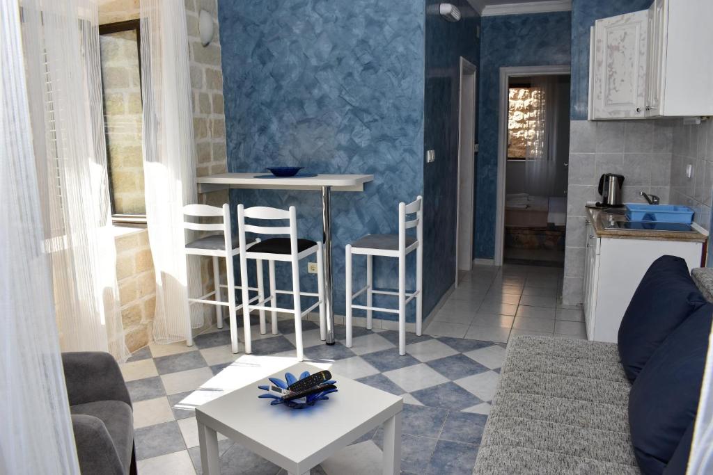 Kuchyň nebo kuchyňský kout v ubytování Lanterna Apartments