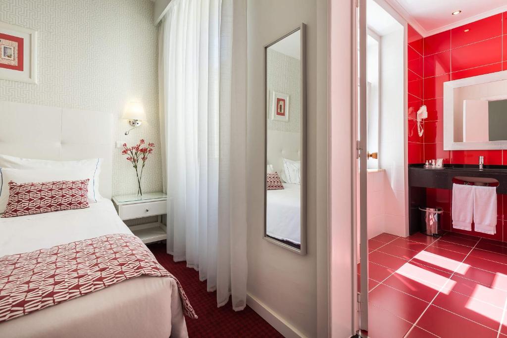 Postel nebo postele na pokoji v ubytování Hotel Florescente